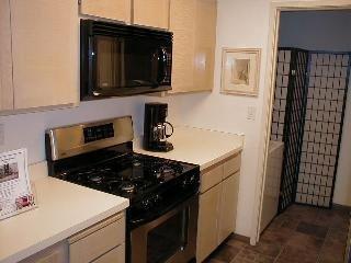 437 Enfrente Road, Unit A Novato, CA 94949 - Photo 3 of 4 a kitchen with a stove and a microwave