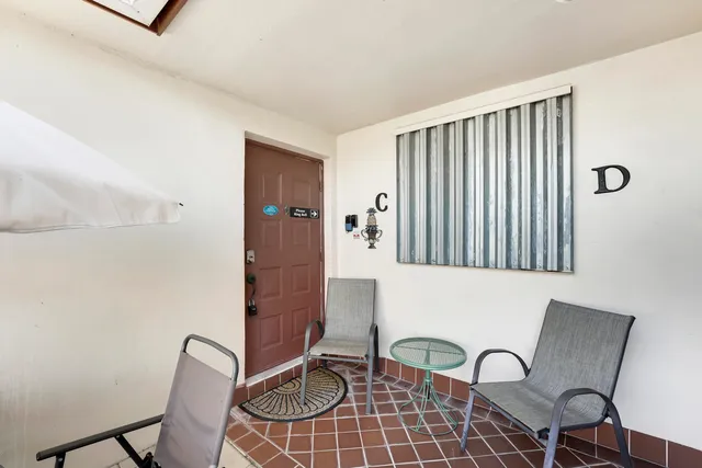 a view of a chairs in a patio