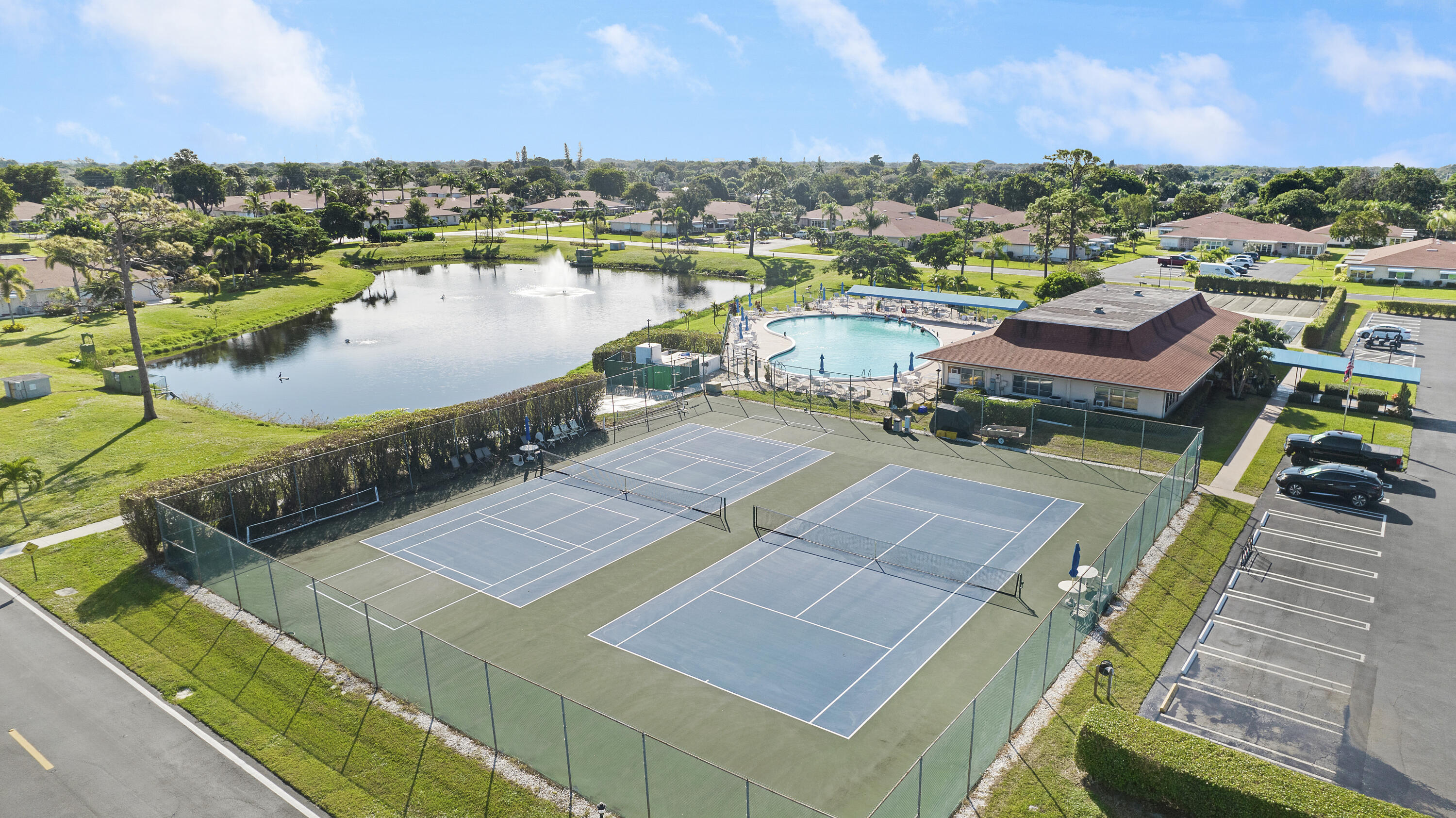 4515 Northwest 3rd Court, Unit C Delray Beach, FL 33445 - Photo 25 of 25 a view of a lake with a patio