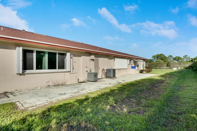 a house with garden in front of it