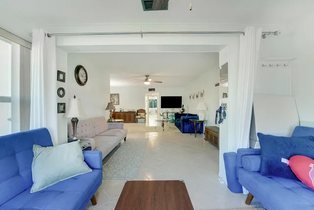 a living room with furniture and a couch