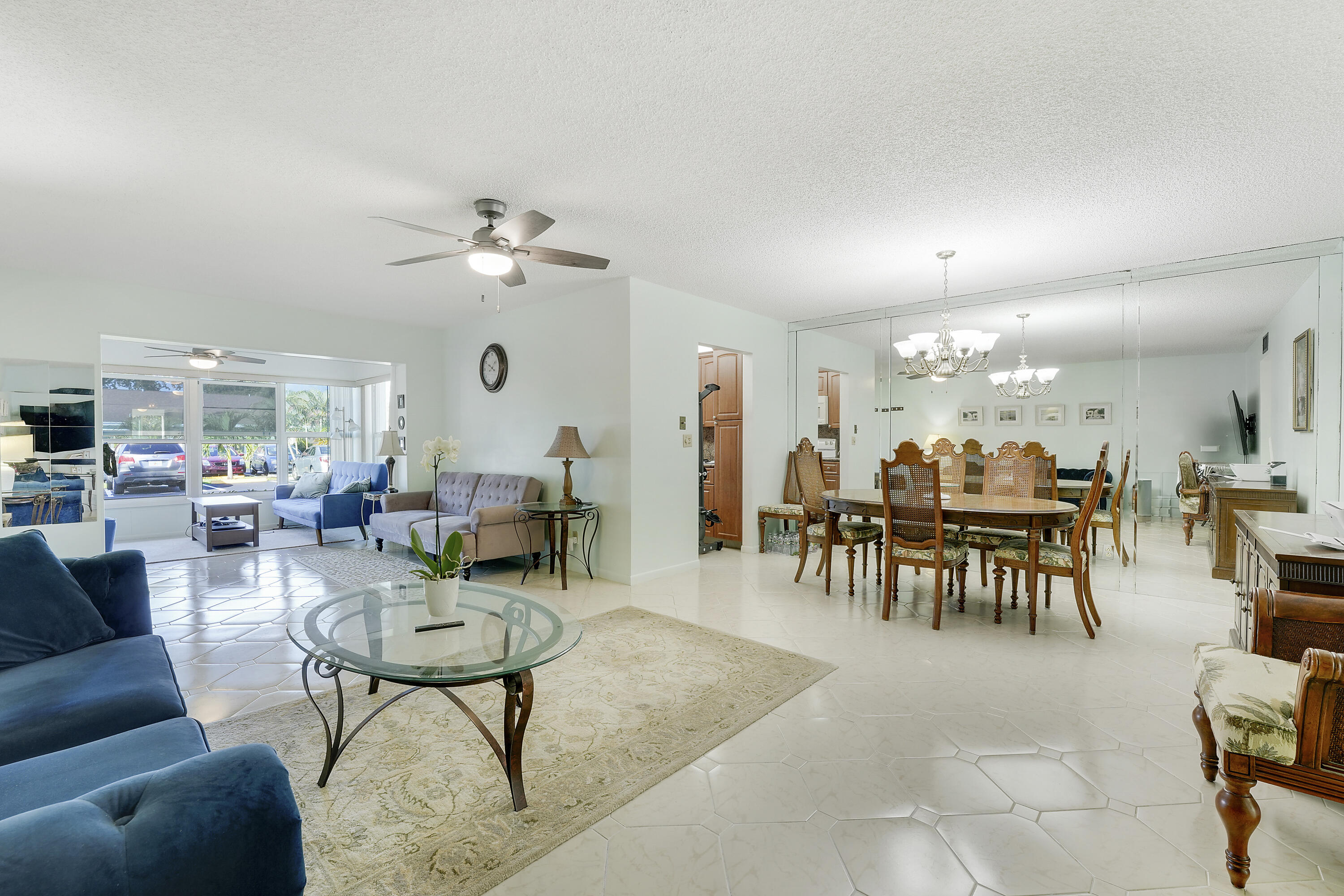 4515 Northwest 3rd Court, Unit C Delray Beach, FL 33445 - Photo 8 of 25 a living room with furniture a table and chairs