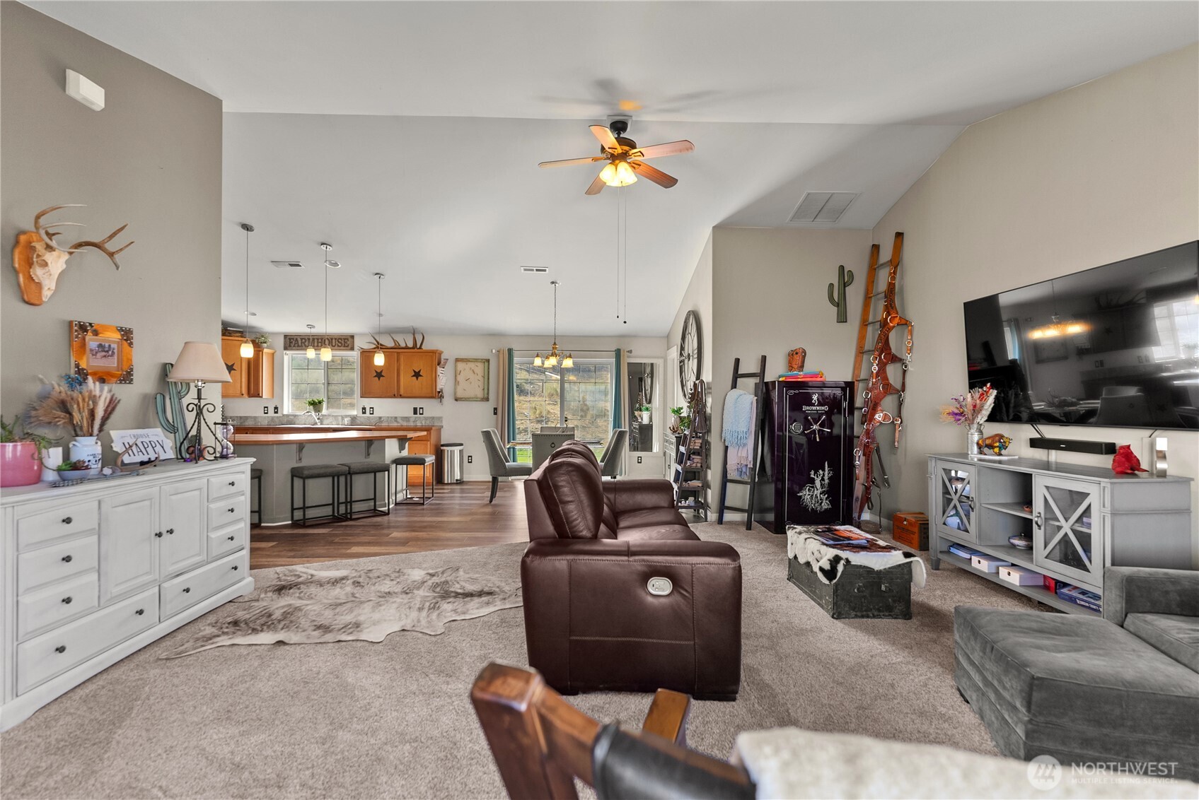 1486 North Star Road Malott, WA 98829 - Photo 17 of 40 a living room with furniture and a flat screen tv