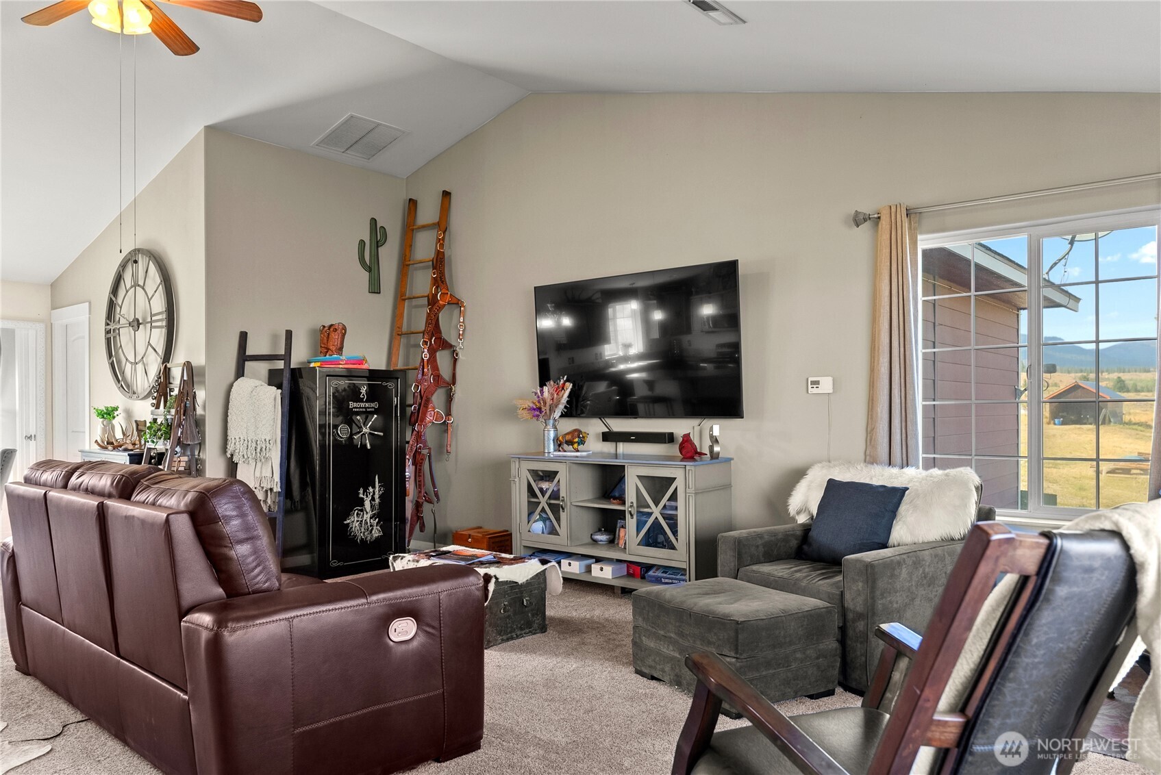 1486 North Star Road Malott, WA 98829 - Photo 18 of 40 a living room with furniture and a flat screen tv