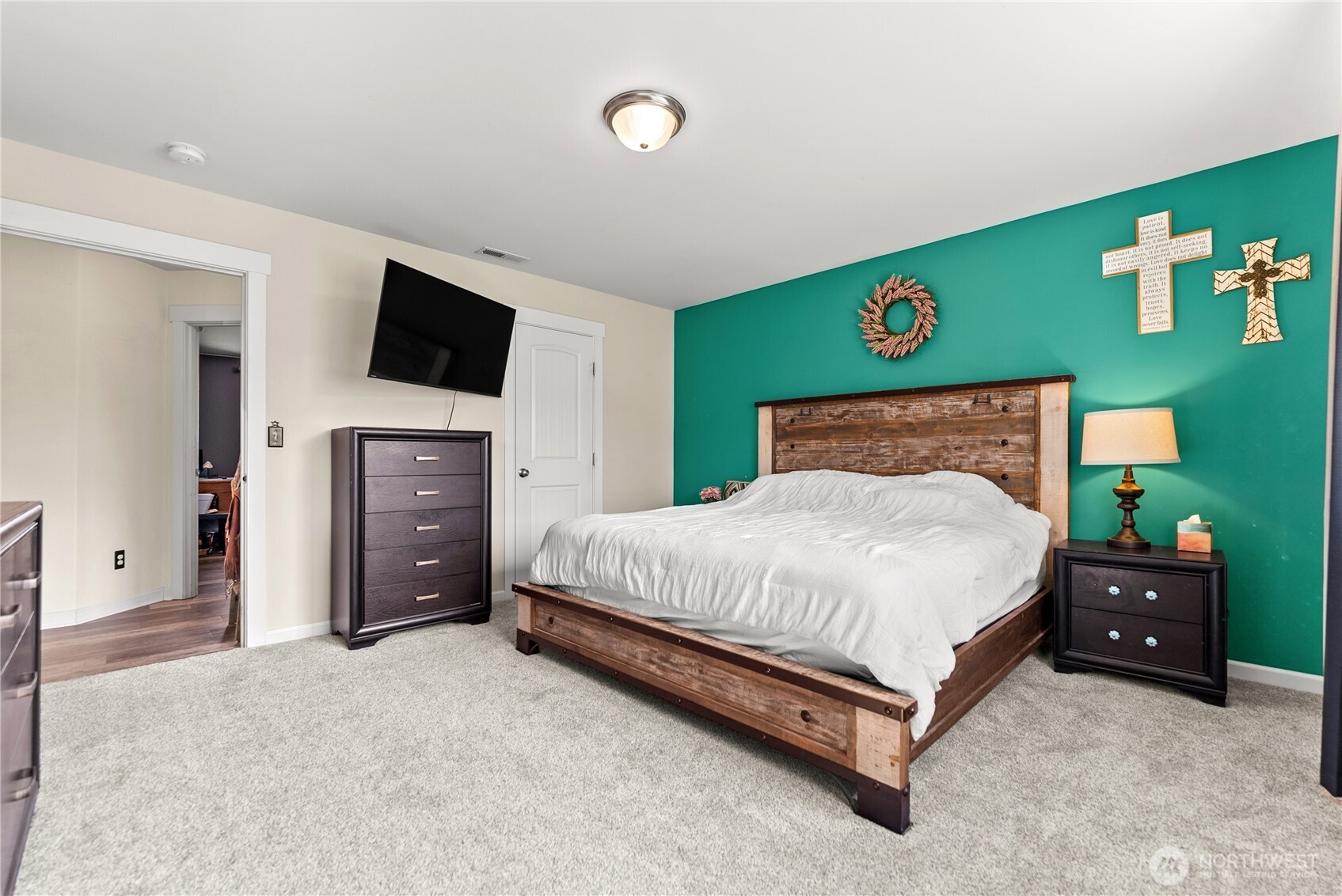 1486 North Star Road Malott, WA 98829 - Photo 22 of 40 a spacious bedroom with a bed and a television