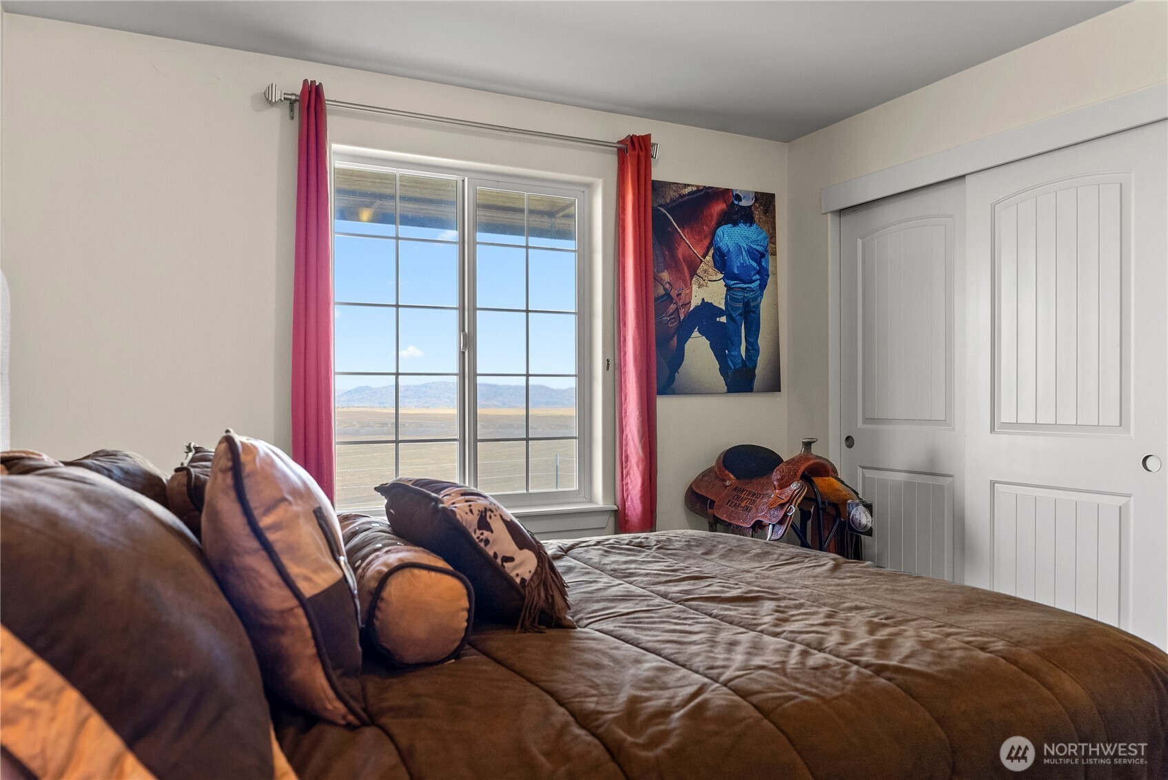 1486 North Star Road Malott, WA 98829 - Photo 27 of 40 a bedroom with a bed and a window