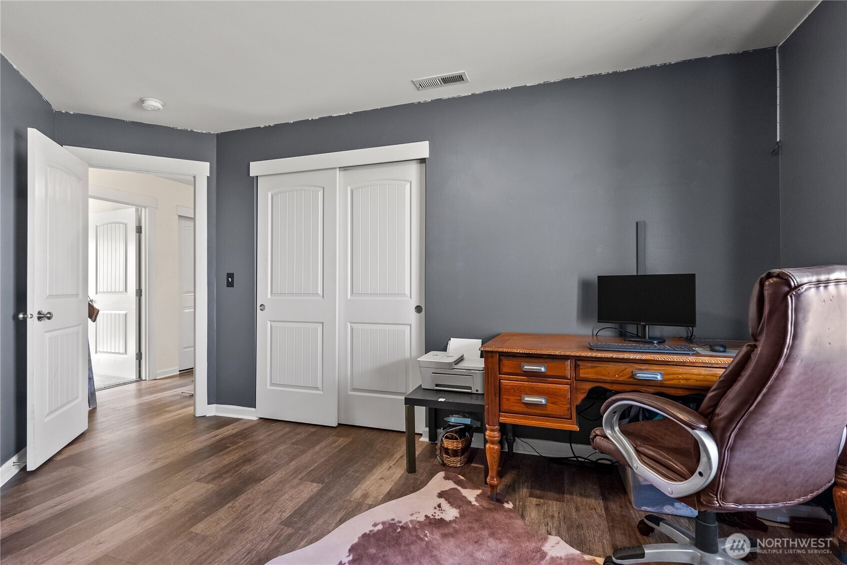 1486 North Star Road Malott, WA 98829 - Photo 28 of 40 a view of a workspace with furniture and wooden floor