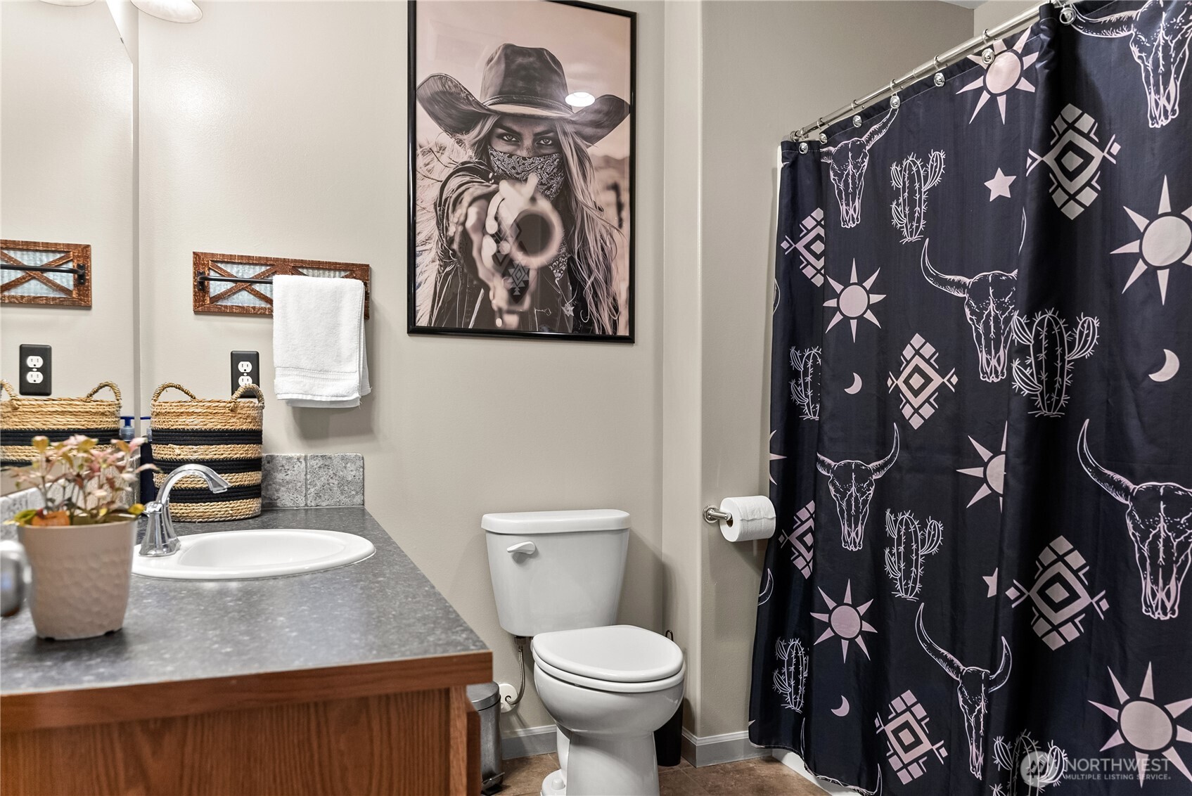 1486 North Star Road Malott, WA 98829 - Photo 30 of 40 a bathroom with a toilet sink and mirror