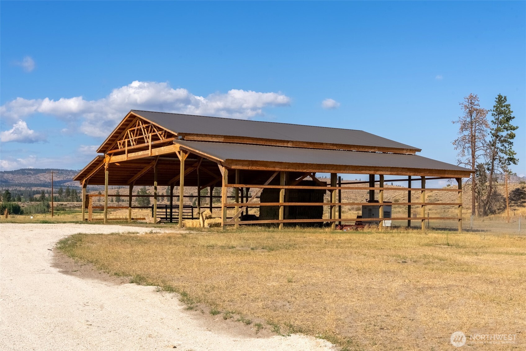 1486 North Star Road Malott, WA 98829 - Photo 33 of 40 a view of a house with a yard and sitting area