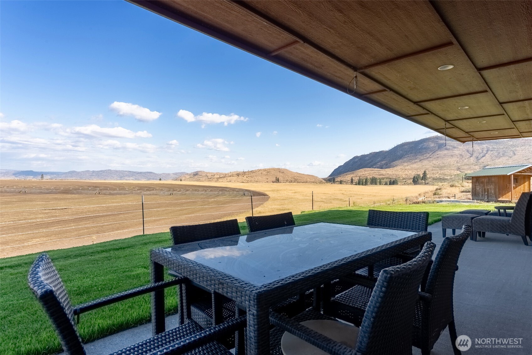 1486 North Star Road Malott, WA 98829 - Photo 35 of 40 a view of a terrace with furniture and a table
