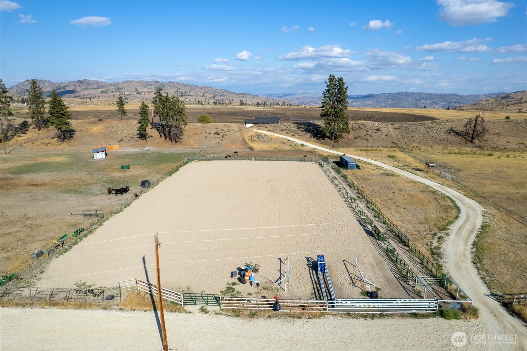 1486 North Star Road Malott, WA 98829 - Photo 39 of 40 a view of a swimming pool with an ocean view