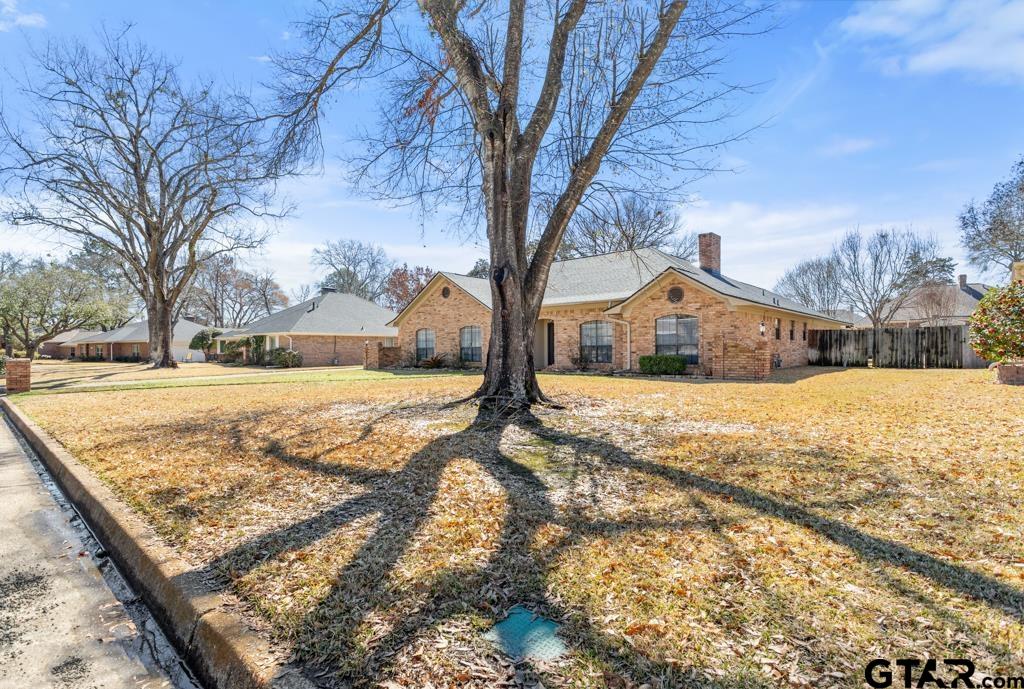 6005 Raleigh Drive Tyler, TX 75703 - Photo 34 of 35 a view of yard covered with snow in front of house