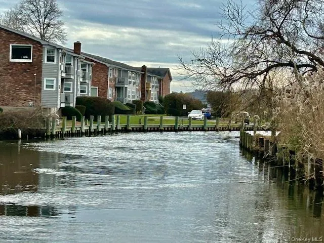 a view of a lake with a house