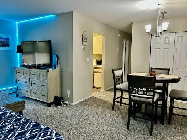 a view of a livingroom with furniture