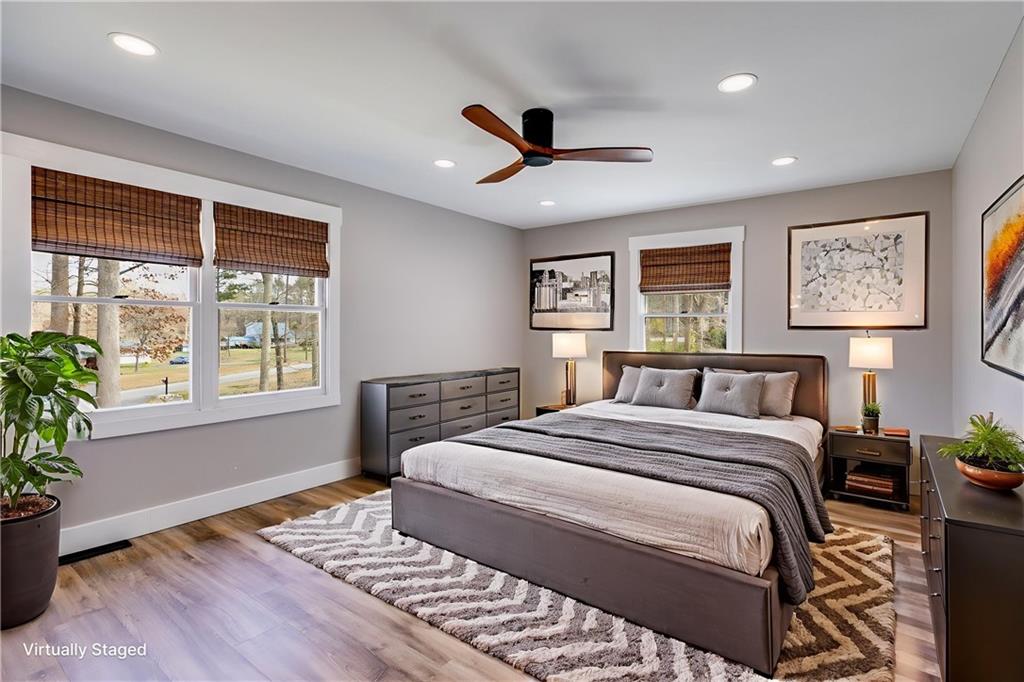 118 Raven Road Villa Rica, GA 30180 - Photo 32 of 59 a bedroom with a large bed and a window