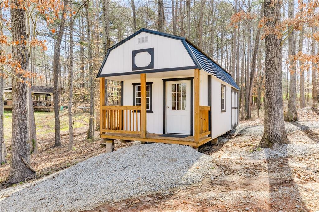 118 Raven Road Villa Rica, GA 30180 - Photo 46 of 59 a front view of a house with basket ball court