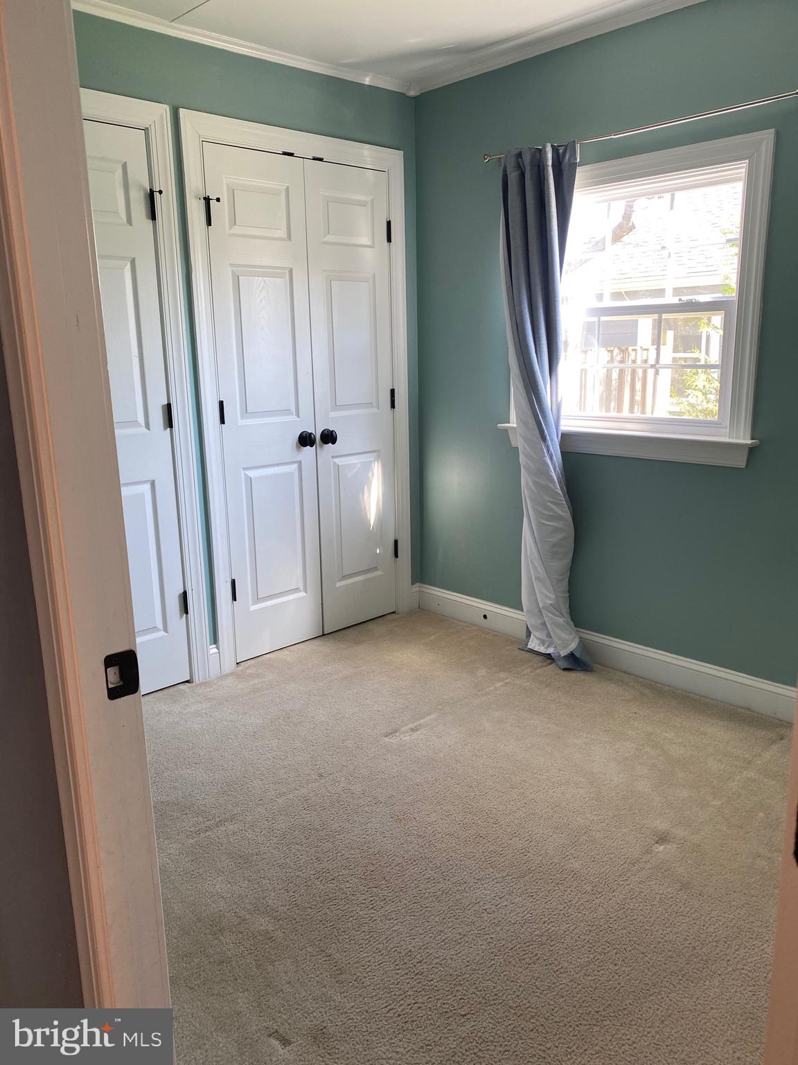 1403 Gleason Street Silver Spring, MD 20902 - Photo 13 of 34 an empty room with windows and closet