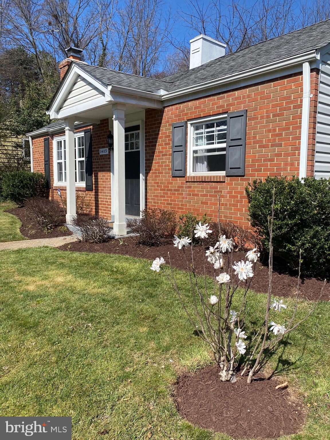 1403 Gleason Street Silver Spring, MD 20902 - Photo 28 of 34 a front view of a house with garden