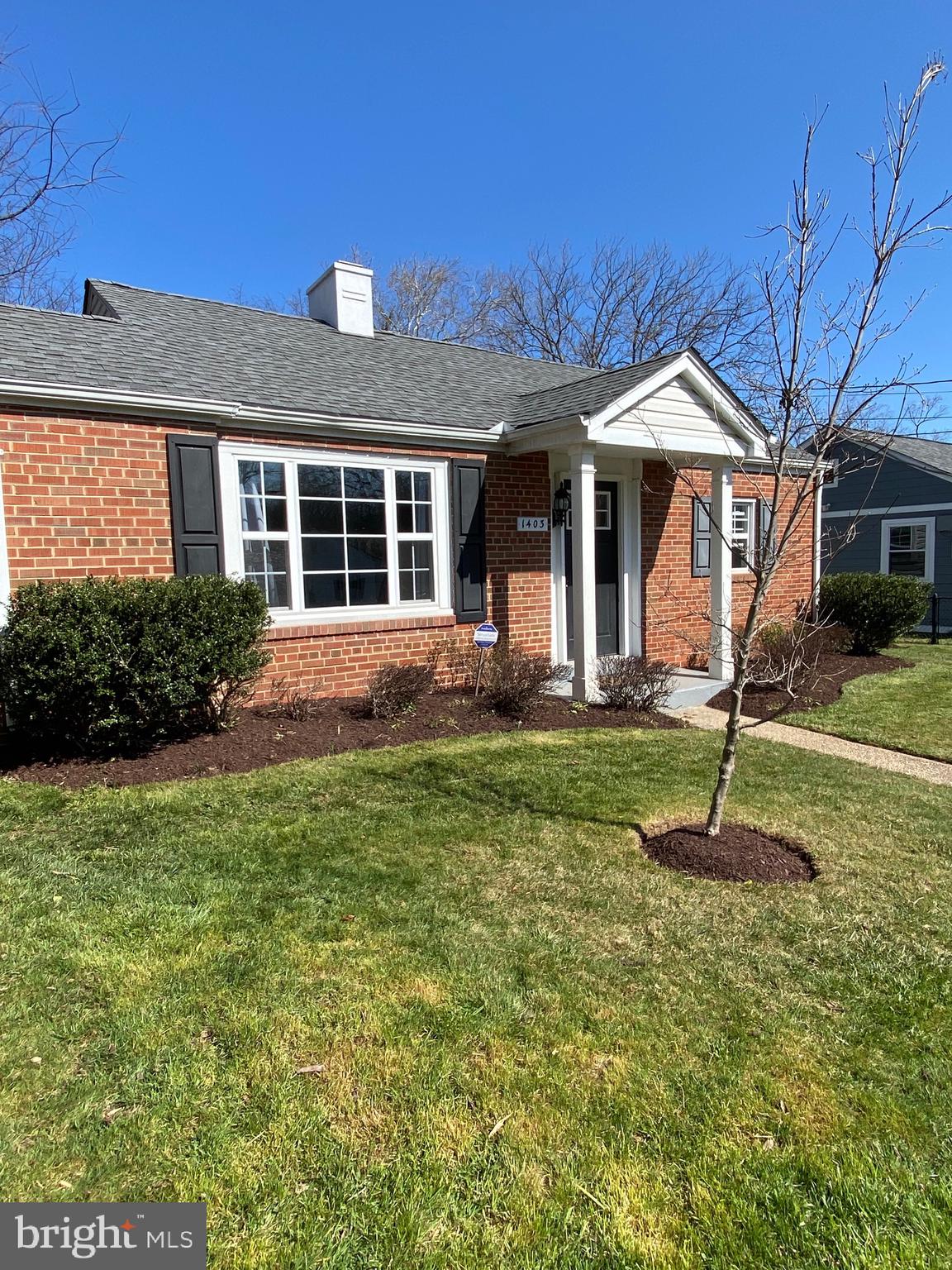 1403 Gleason Street Silver Spring, MD 20902 - Photo 29 of 34 a front view of a house with a yard