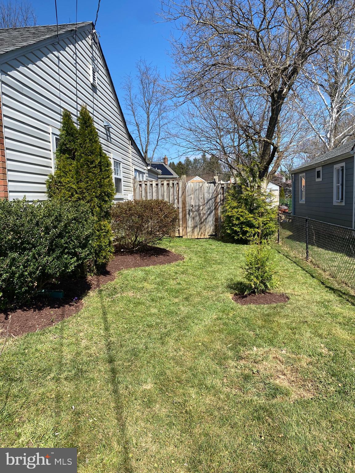 1403 Gleason Street Silver Spring, MD 20902 - Photo 30 of 34 a view of a house with a yard