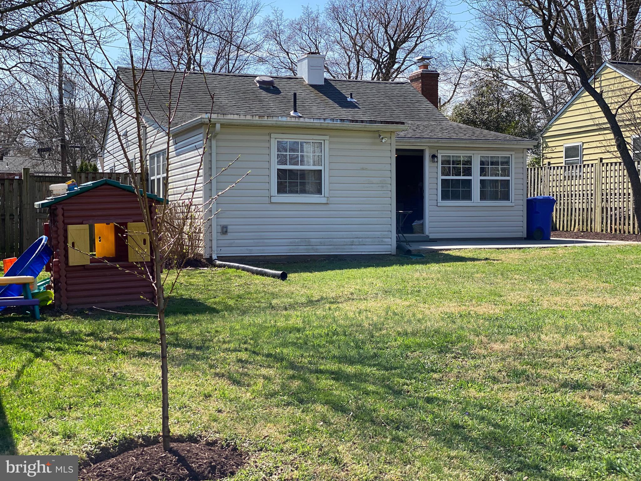 1403 Gleason Street Silver Spring, MD 20902 - Photo 32 of 34 a view of a house with a yard and sitting area