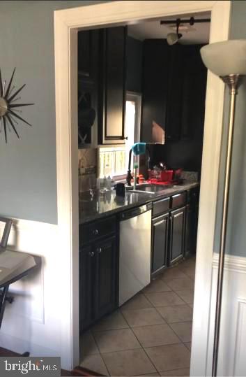 1403 Gleason Street Silver Spring, MD 20902 - Photo 10 of 34 a kitchen with a sink and a refrigerator