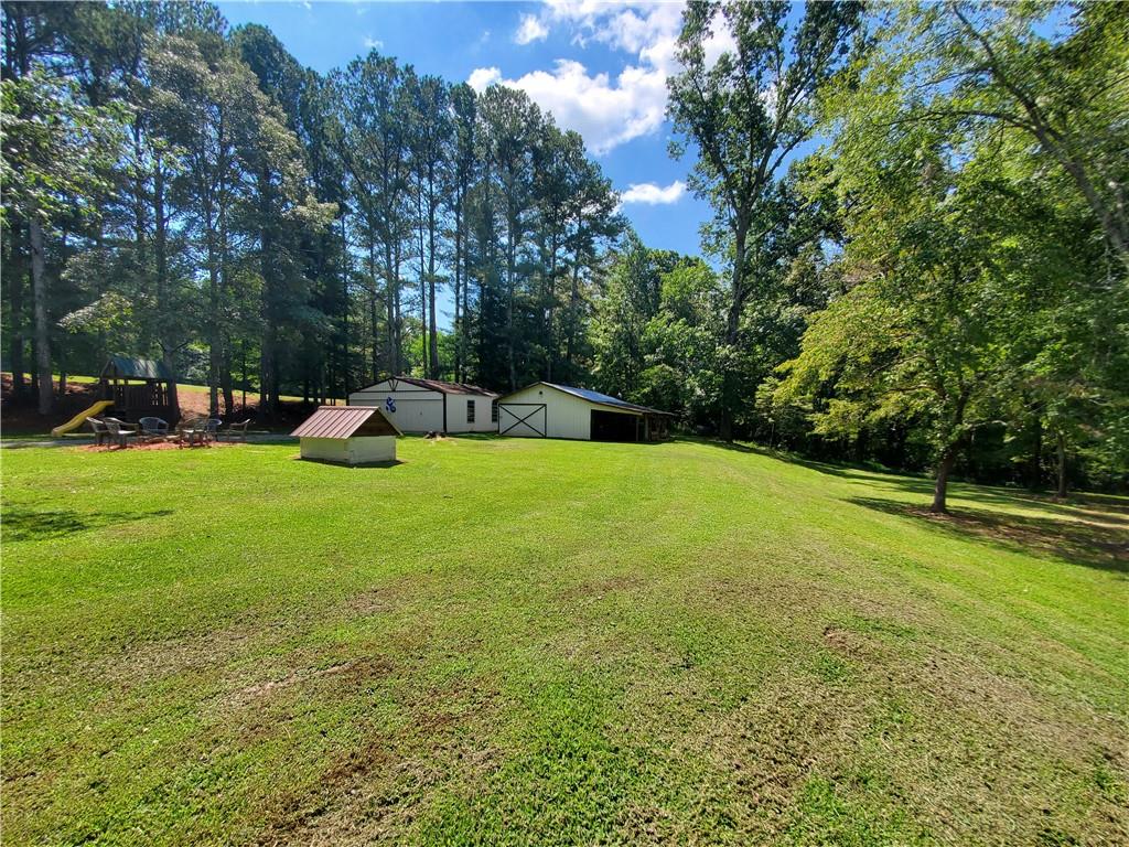 606 Keetor Road Talking Rock, GA 30175 - Photo 58 of 93 a view of a golf course with a park