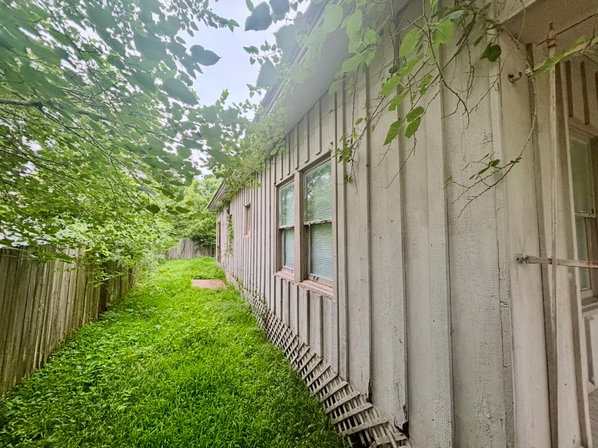 6124 Goforth Street Houston, TX 77021 - Photo 16 of 21 a view of a pathway of a house with a yard and plants