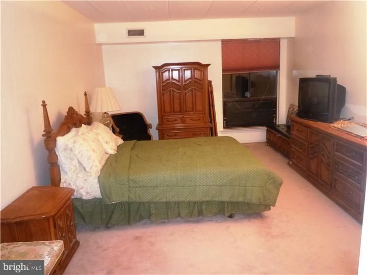 8920 Krewstown Road, Unit 215 Philadelphia, PA 19115 - Photo 15 of 25 Master Bedroom