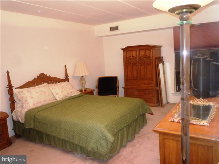 8920 Krewstown Road, Unit 215 Philadelphia, PA 19115 - Photo 16 of 25 Master Bedroom