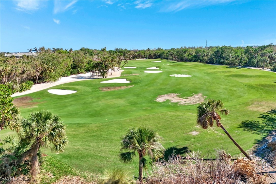 2450 Wulfert Road Sanibel, FL 33957 - Photo 35 of 44 a view of a golf course with a garden