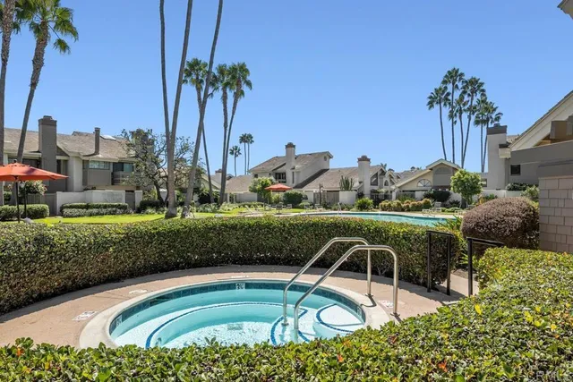 a view of swimming pool with a yard and outdoor seating