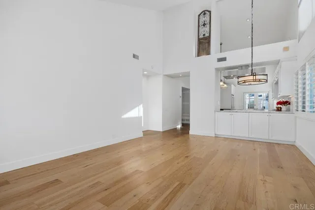 a view of kitchen with wooden floor