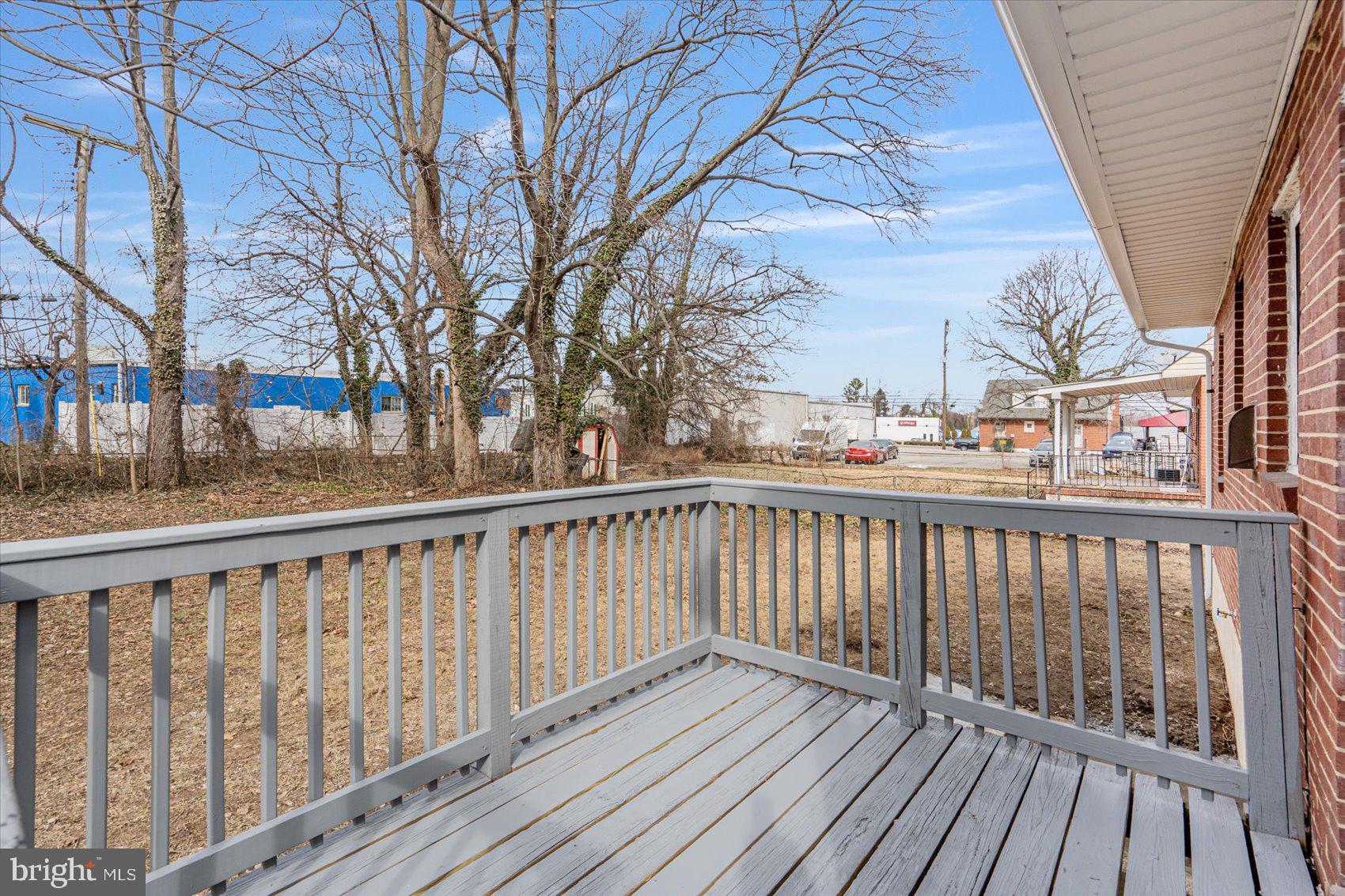 3526 Millvale Road Baltimore, MD 21244 - Photo 36 of 41 a balcony with wooden floor and fence