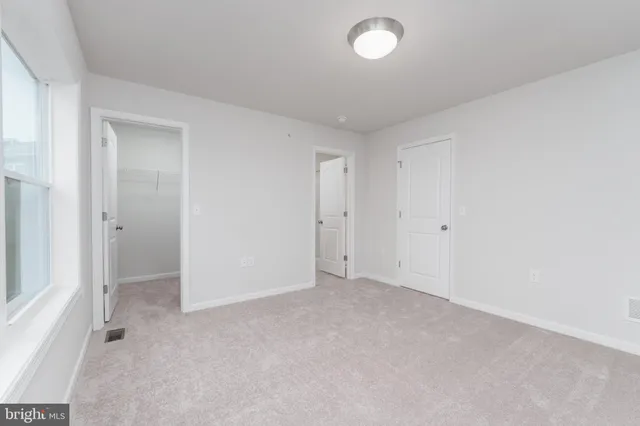 an empty room with an entryway