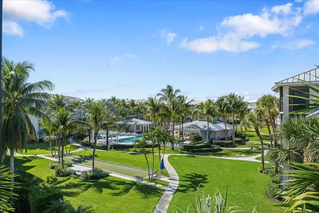 a view of a house with a big yard