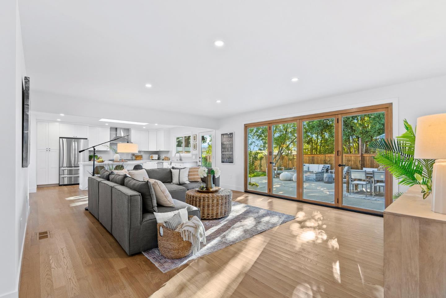880 Pinehurst Drive Aptos, CA 95003 - Photo 13 of 25 a living room with furniture large windows and wooden floor
