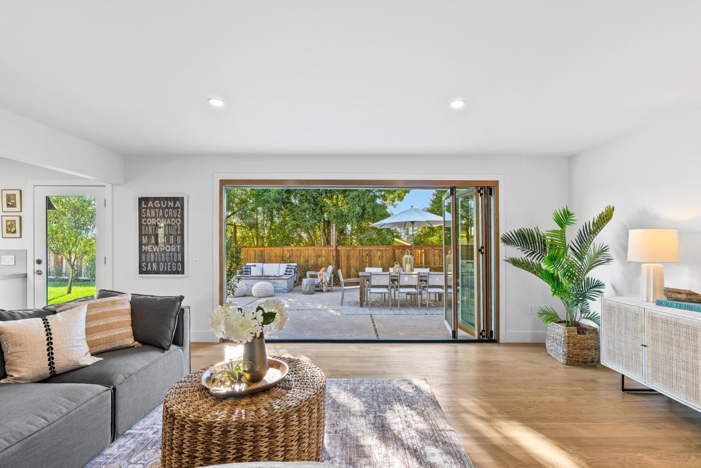 880 Pinehurst Drive Aptos, CA 95003 - Photo 14 of 25 a living room with furniture and a potted plant