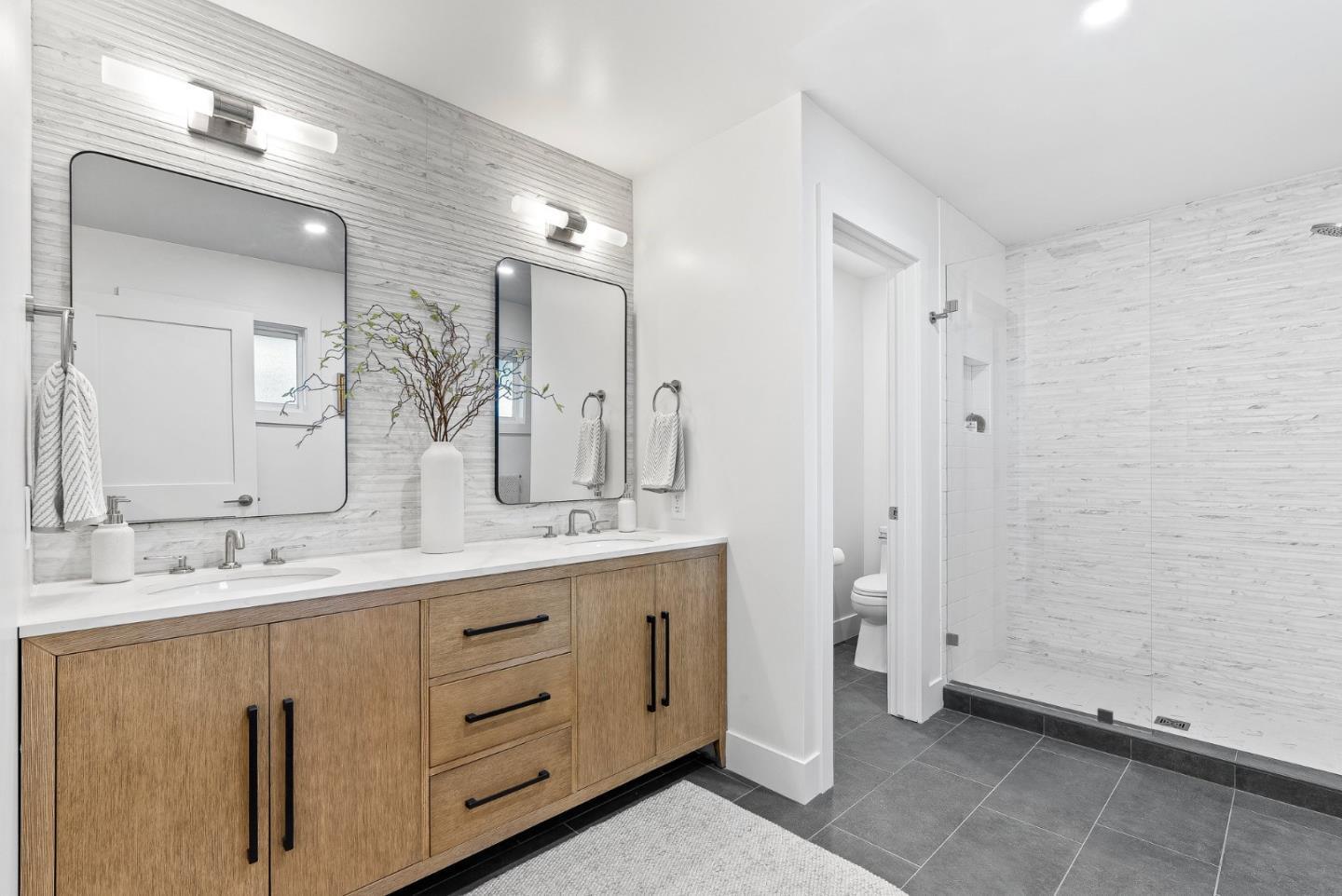 880 Pinehurst Drive Aptos, CA 95003 - Photo 17 of 25 a bathroom with a double vanity sink mirror and double