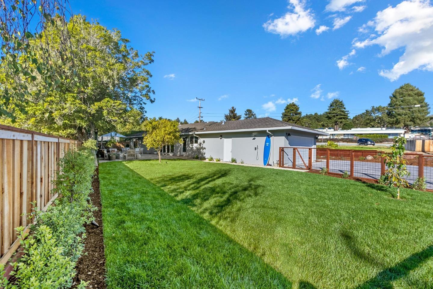 880 Pinehurst Drive Aptos, CA 95003 - Photo 9 of 25 a view of a house with backyard and garden