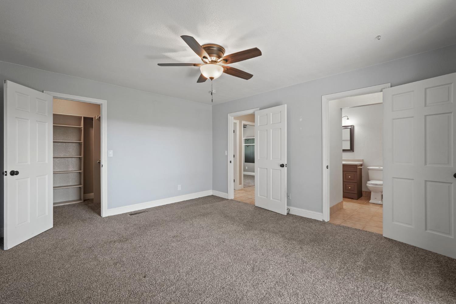 24980 North Canyon Way Colfax, CA 95713 - Photo 24 of 30 a view of a livingroom with a ceiling fan & entryway