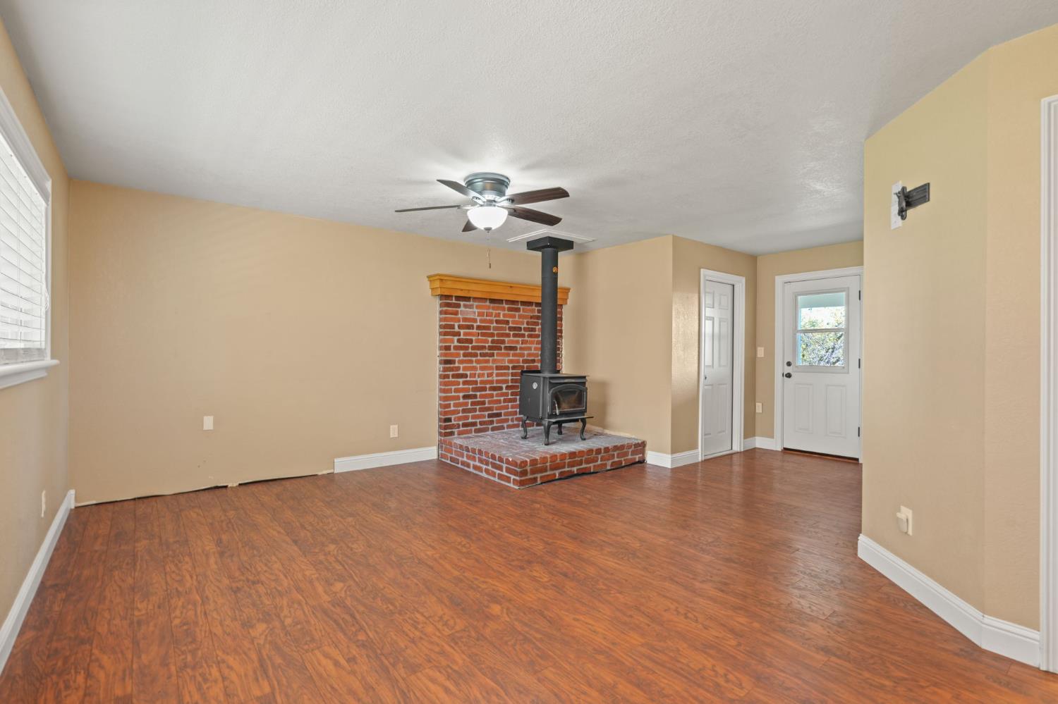 24980 North Canyon Way Colfax, CA 95713 - Photo 8 of 30 wooden floor in an empty room with a window