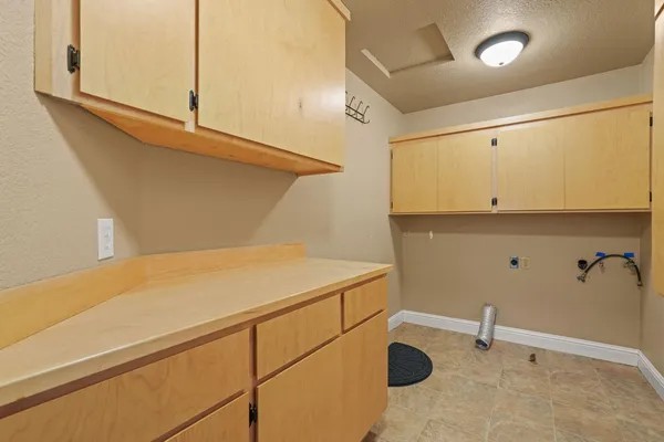 a kitchen with a sink stove and refrigerator