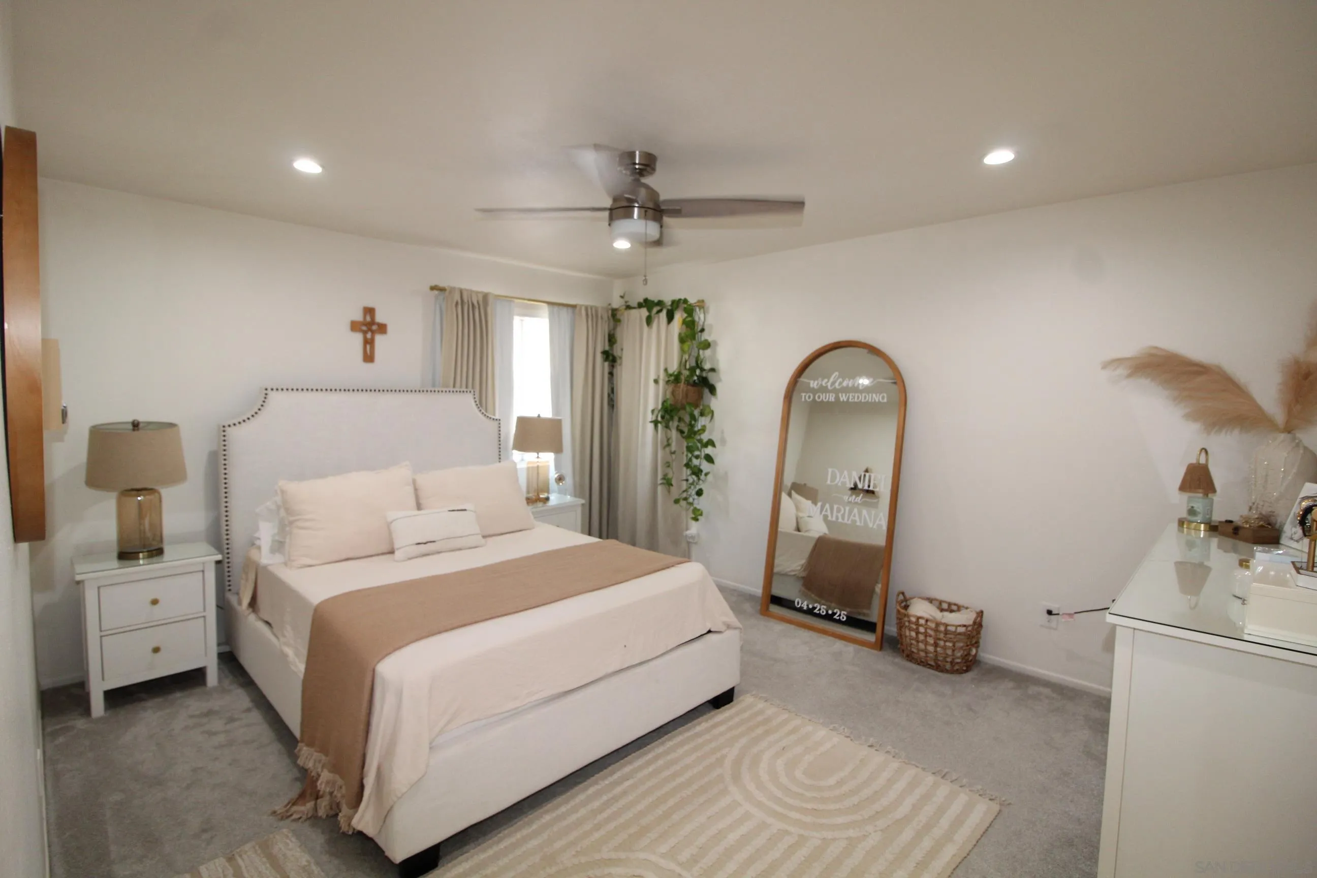 783 Timber Cove Way Oceanside, CA 92058 - Photo 13 of 28 a bedroom with a bed and a dresser