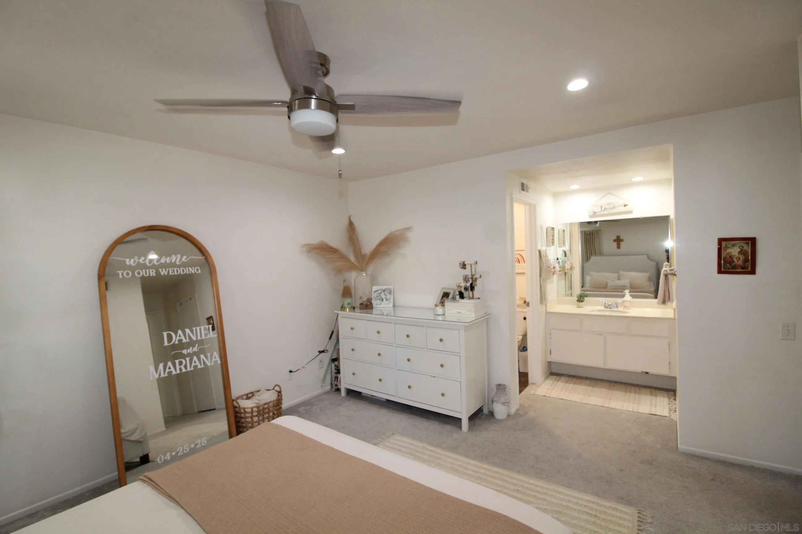 783 Timber Cove Way Oceanside, CA 92058 - Photo 15 of 28 a spacious bedroom with a bed and a cabinets