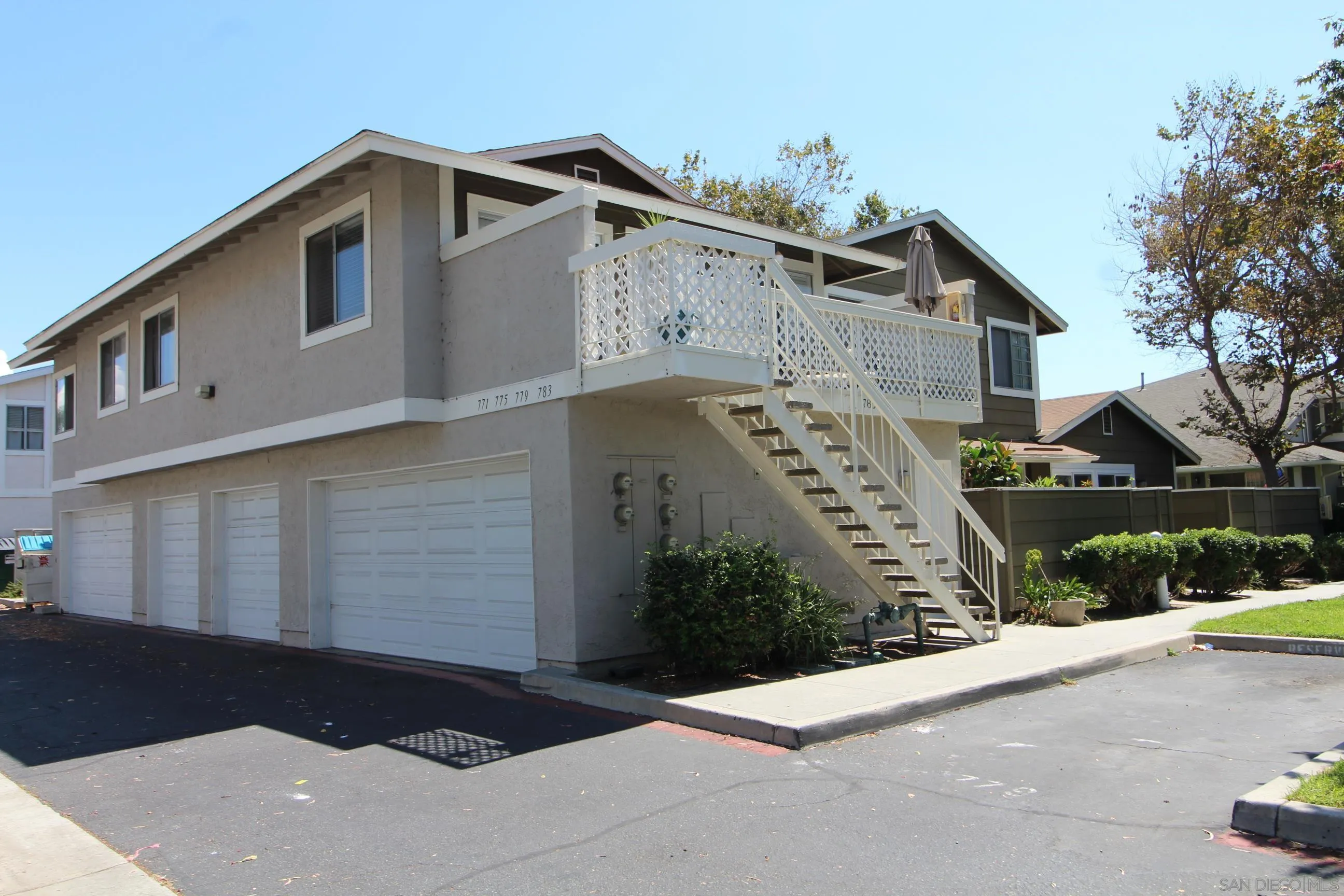 783 Timber Cove Way Oceanside, CA 92058 - Photo 28 of 28 a front view of a house with a garden