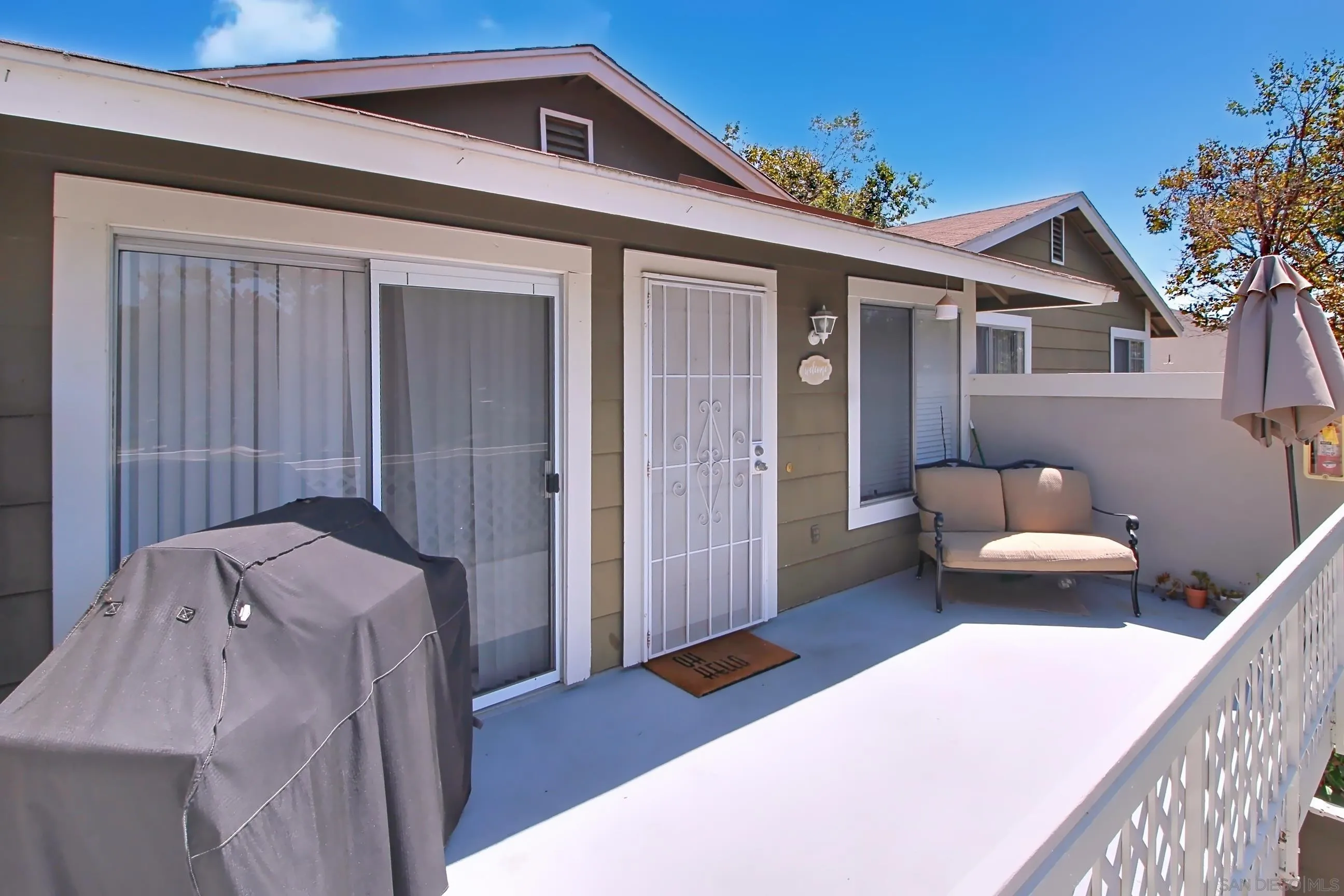 783 Timber Cove Way Oceanside, CA 92058 - Photo 4 of 28 a front view of a house with outdoor seating