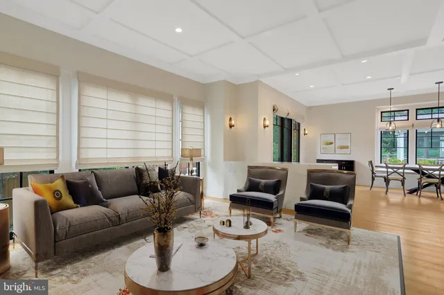 a bathroom with a large tub sink and mirror