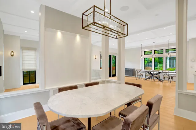 a bathroom with a sink toilet and a mirror