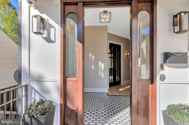 a picture of a bathroom with a glass door